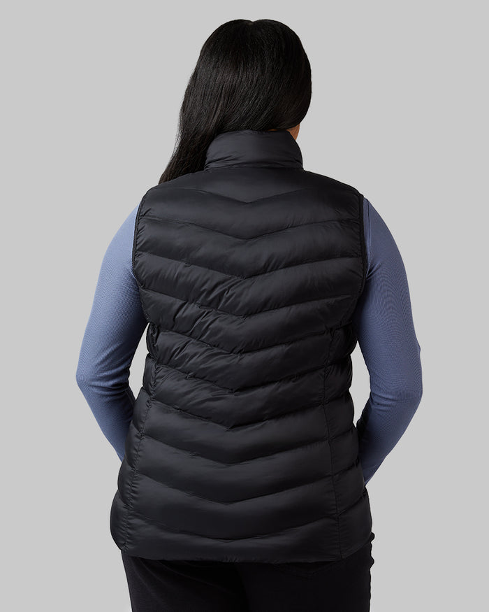 32 Degrees Black _ Women's Lightweight Packable Vest {model: Jeharna is 5'9" and size 14 wearing size L}{bottom}{right} {bottom}{right}
