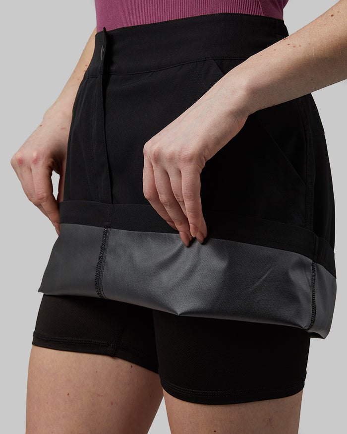 32 Degrees Black  _ Women's Outdoor Cargo skort {model: Ava is 5'8"and size 4 wearing size S}{bottom}{right} {bottom}{right}