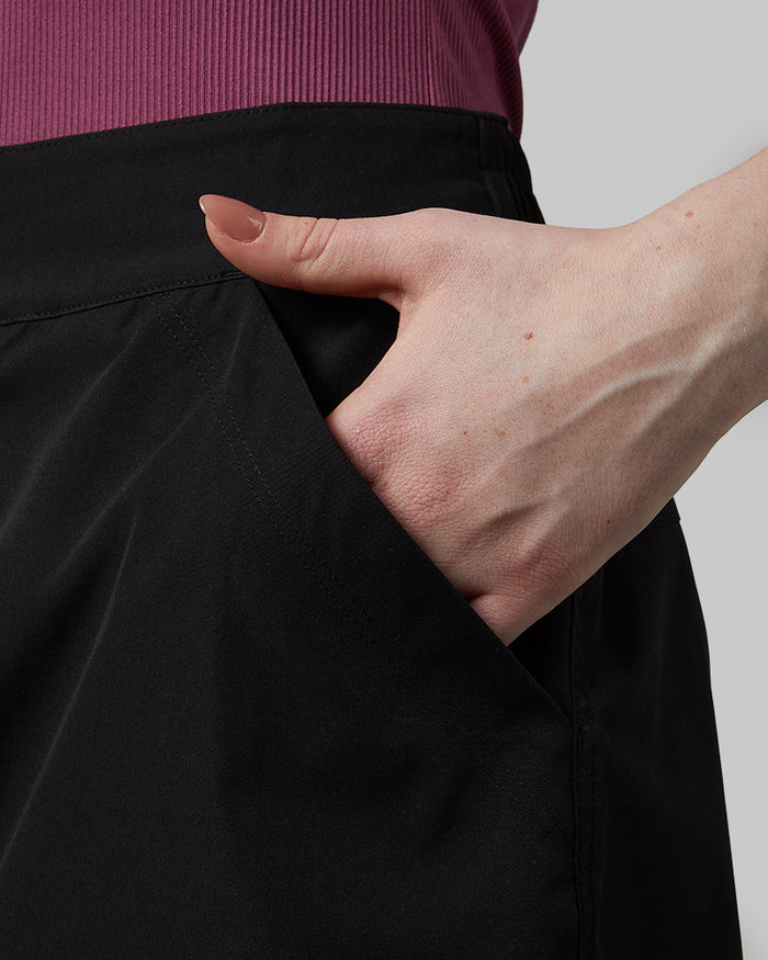 32 Degrees Black  _ Women's Outdoor Cargo skort {model: Ava is 5'8"and size 4 wearing size S}{bottom}{right} {bottom}{right}