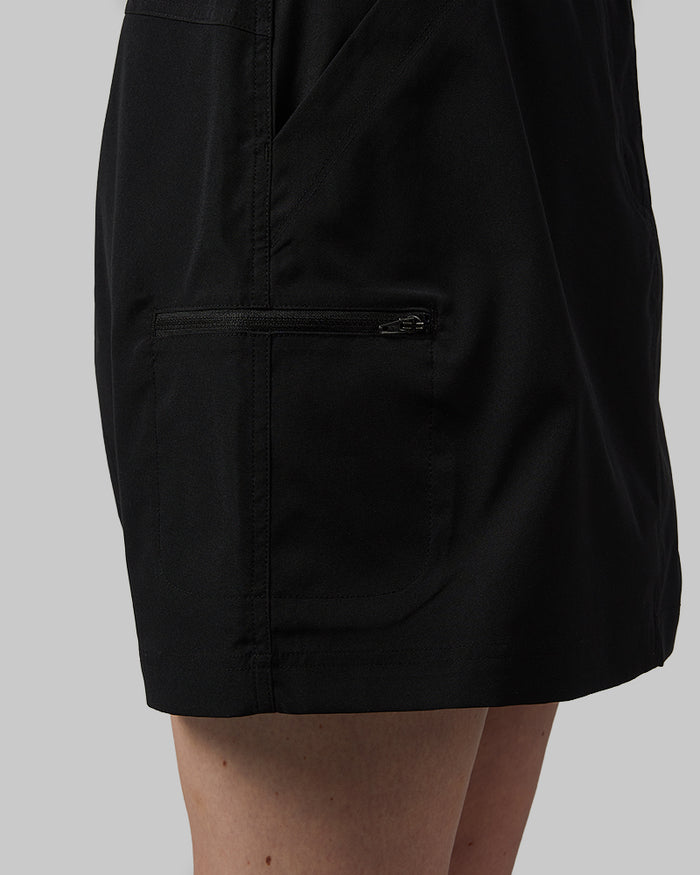 32 Degrees Black  _ Women's Outdoor Cargo skort {model: Ava is 5'8"and size 4 wearing size S}{bottom}{right} {bottom}{right}