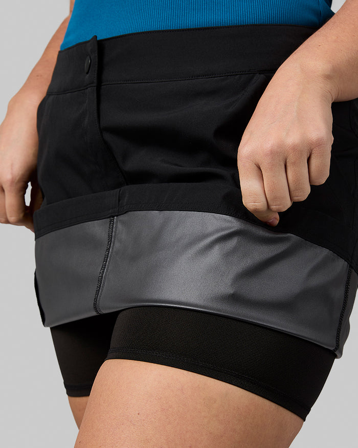 32 Degrees Black  _ Women's Outdoor Cargo skort {model: Madeline is 5'10"and size 12 wearing size L}{bottom}{right} {bottom}{right}