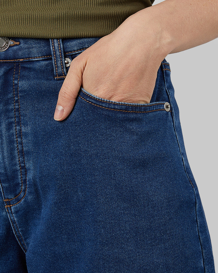 32 Degrees Indigo Wash _ Women's stretch Comfort Jean 5-Inch short {model: Xenia is 5'9"and size 2 wearing size S}{bottom}{right} {bottom}{right}