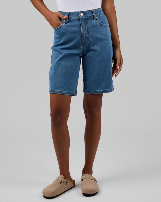 32 Degrees Medium Indigo Wash _ Women's stretch Comfort Jean Bermuda short  {model: Meli is 5'9.5"and size S wearing size 4}{bottom}{right} {bottom}{right}