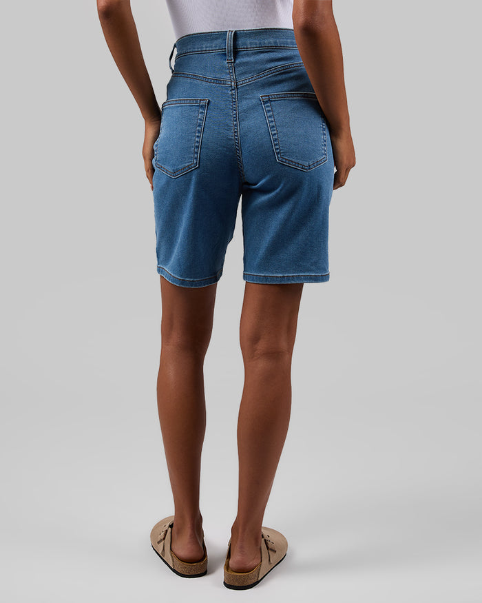 32 Degrees Medium Indigo Wash _ Women's stretch Comfort Jean Bermuda short  {model: Meli is 5'9.5"and size S wearing size 4}{bottom}{right} {bottom}{right}