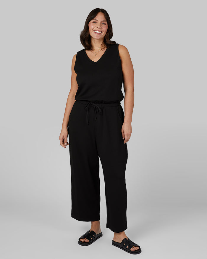 32 Degrees Black _ Women's studio Tech Jumpsuit {model: Maya is 5'7"and size 12 wearing size L}{bottom}{right} {bottom}{right}