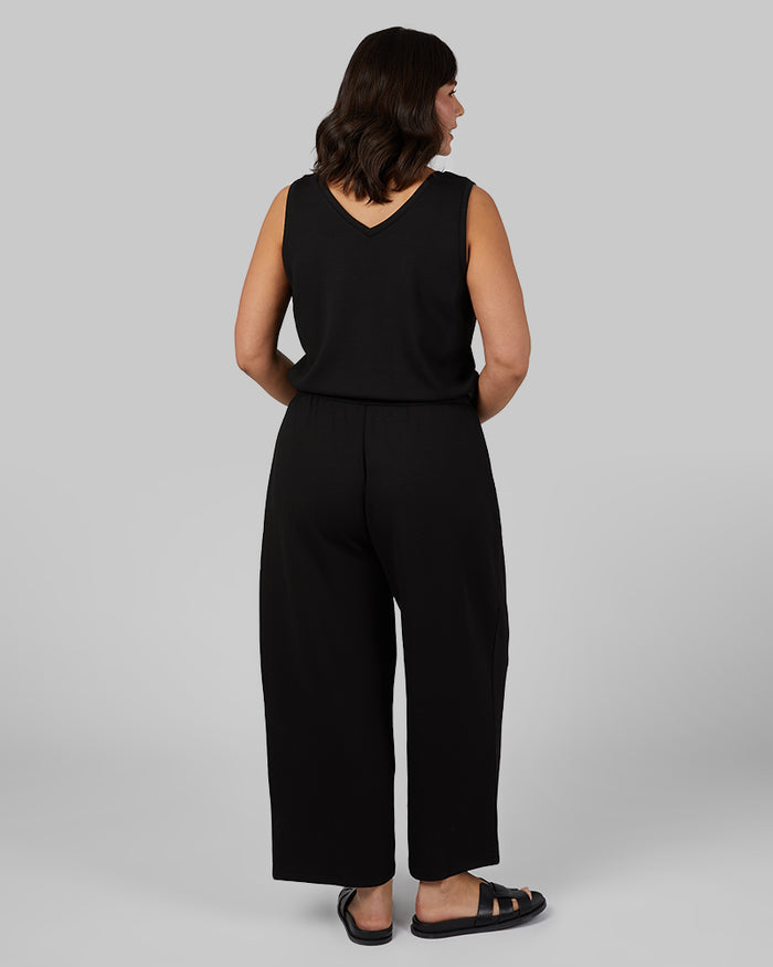 32 Degrees Black _ Women's studio Tech Jumpsuit {model: Maya is 5'7"and size 12 wearing size L}{bottom}{right} {bottom}{right}